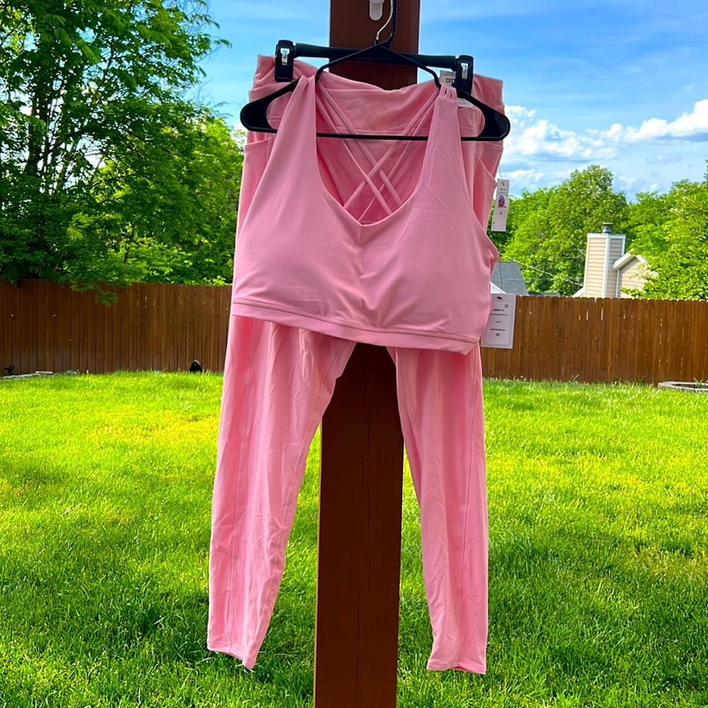 NWT 2 piece set curve strappy sport crop and cross over full length tight.